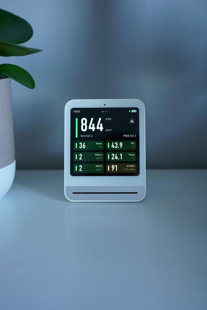 Close-up of a digital hygrometer measuring room humidity